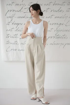 High-waisted wide-legged trousers