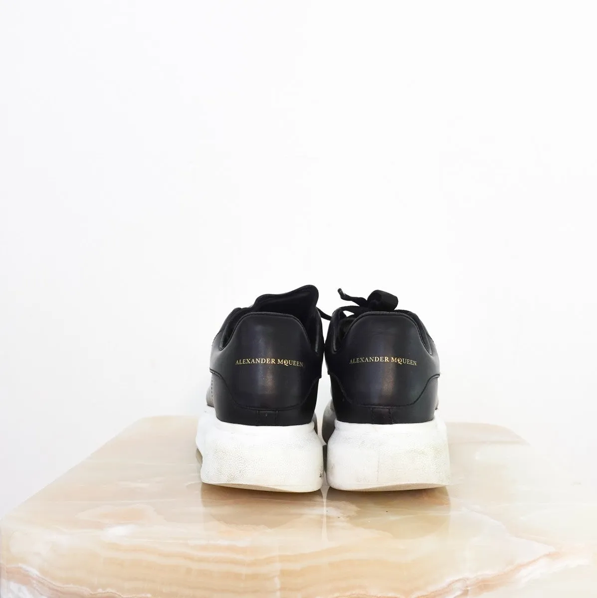 Leather exaggerated-sole sneakers RRP £460
