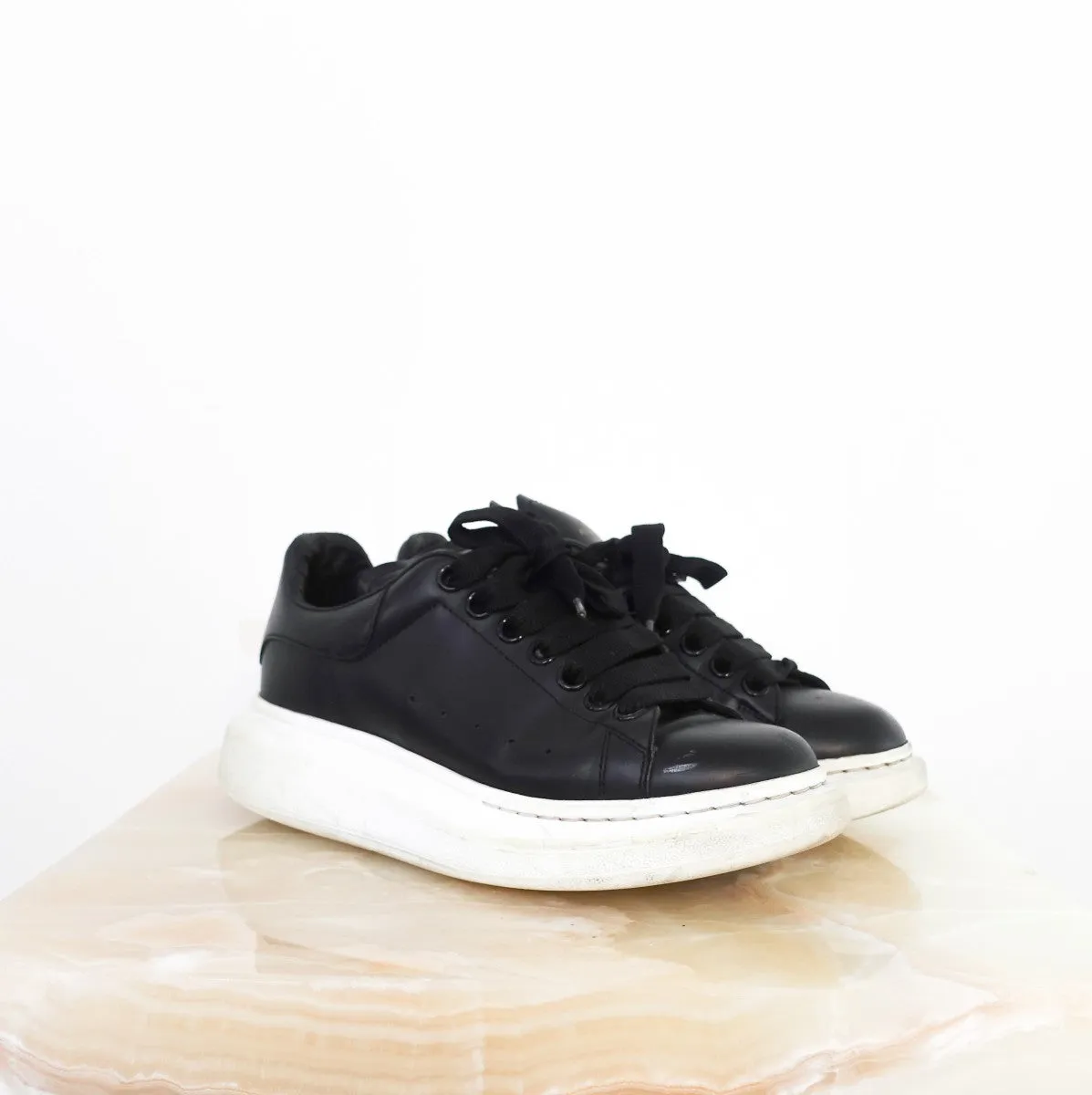 Leather exaggerated-sole sneakers RRP £460