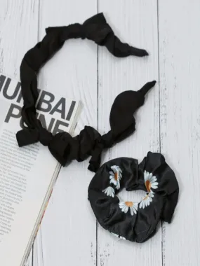 Monochrome Daisy Duo: Classic Black Twisted Headband and Floral Scrunchie Set
