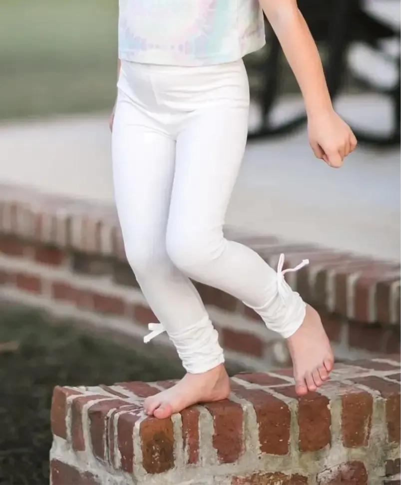 Never Basic Evie's Backyard White Ruched Ankle Bow Accent Leggings