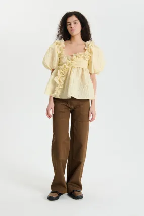 ORIANA | TOP FLURRY MATELASSÉ SOFT YELLOW