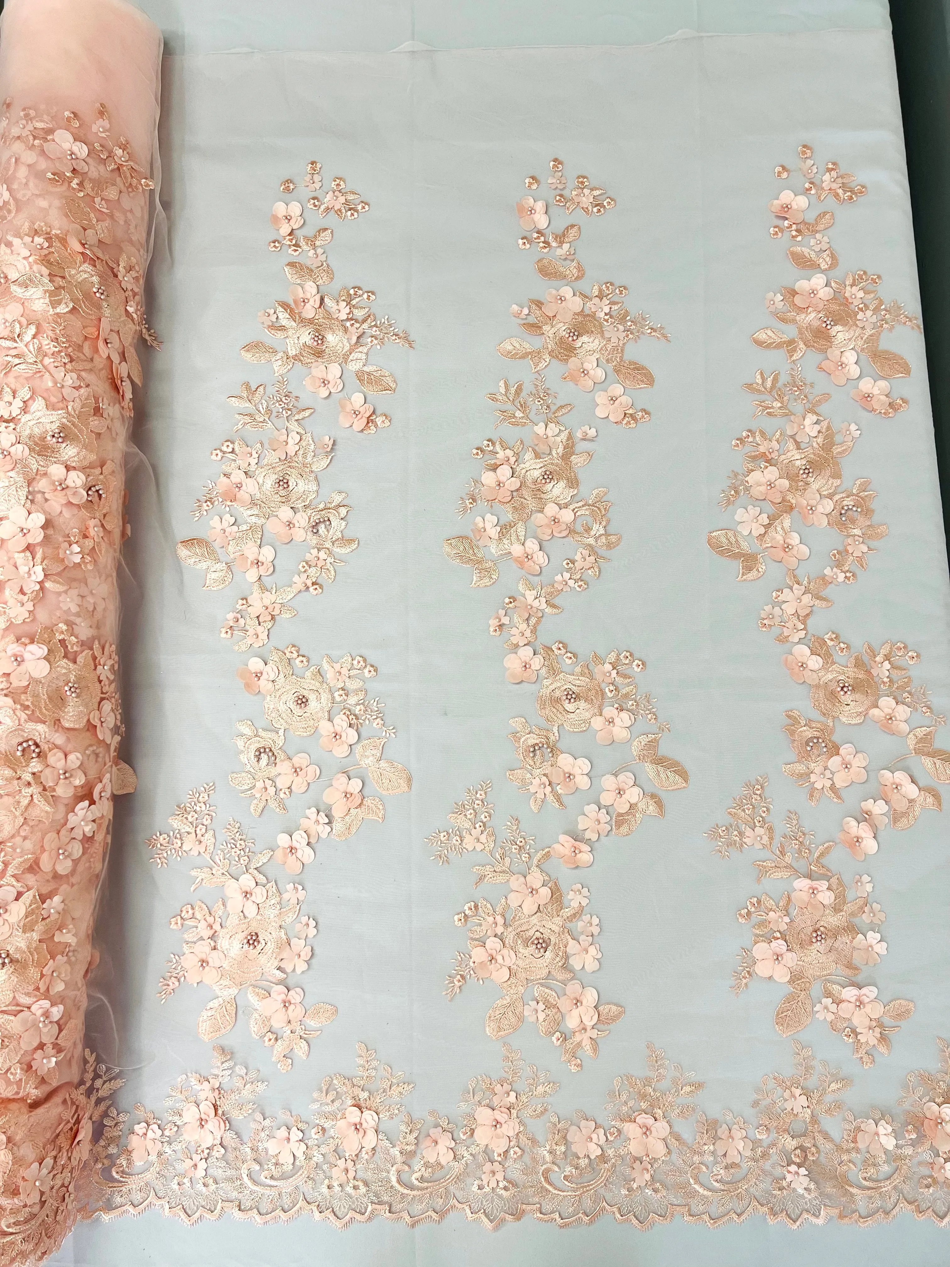 Scarlet 3d floral design embroider with pearls in a mesh lace-sold by the yard.