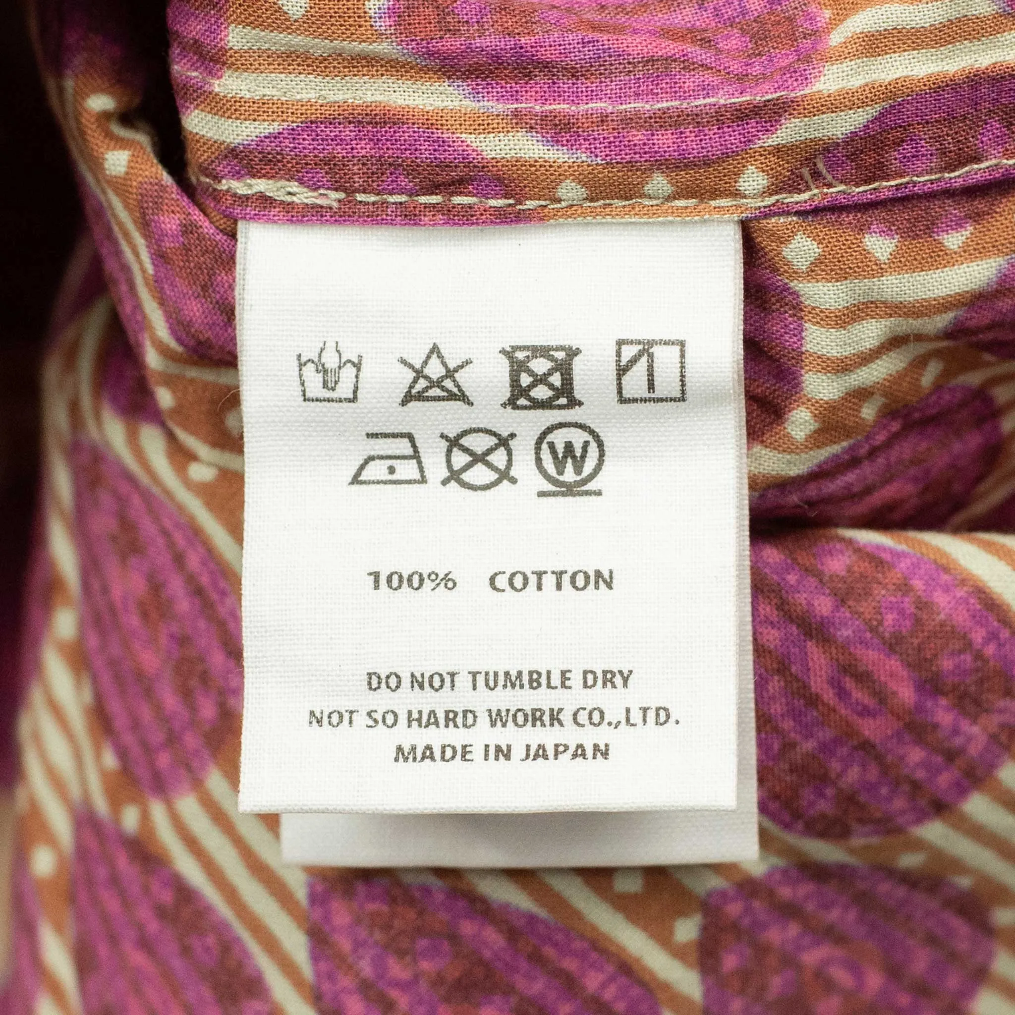 Short sleeve convertible collar shirt in magenta ikat print