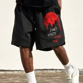 slogan-print mesh track shorts