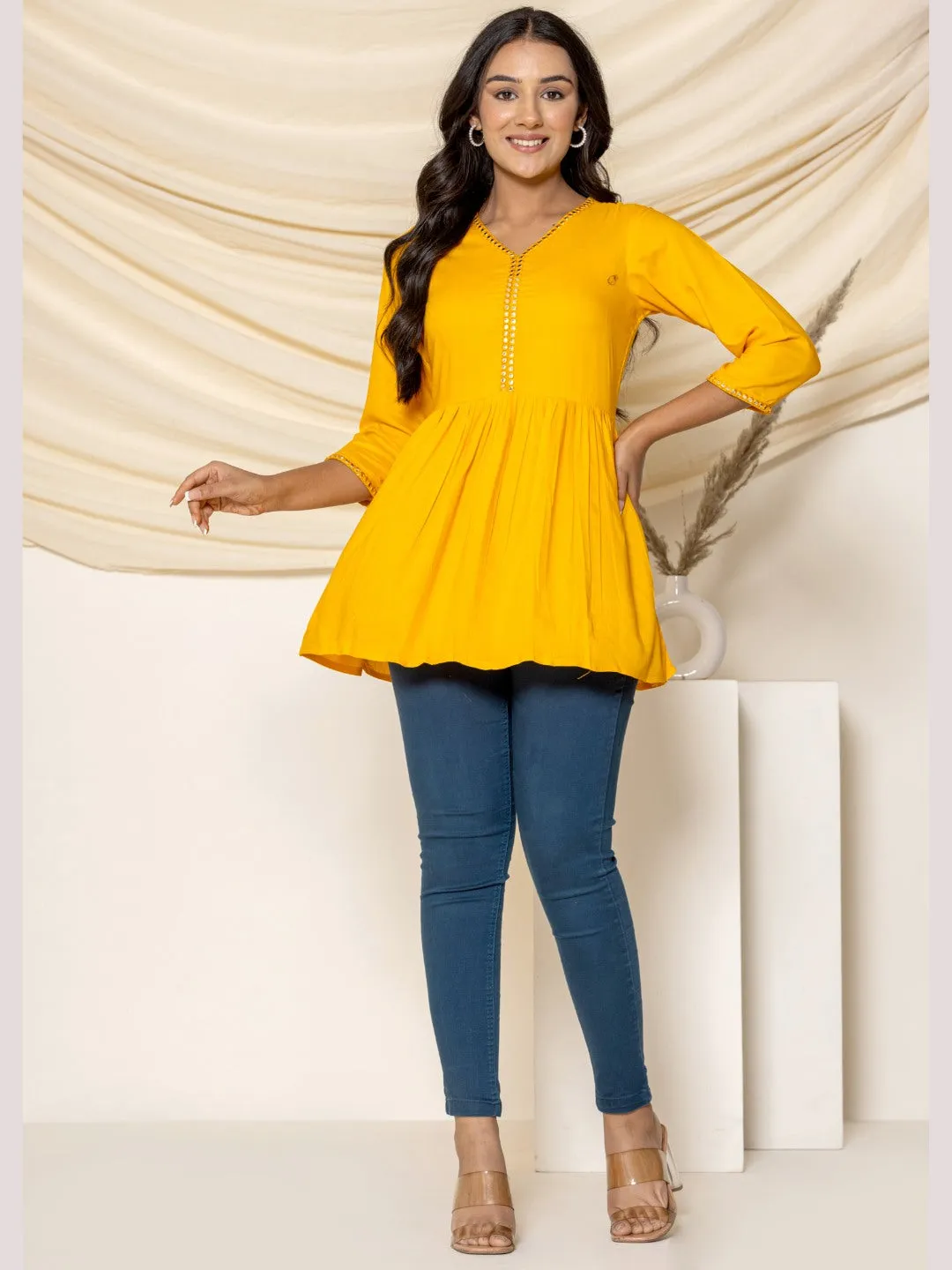 Solid Embroidered Peplum Top - Mustard