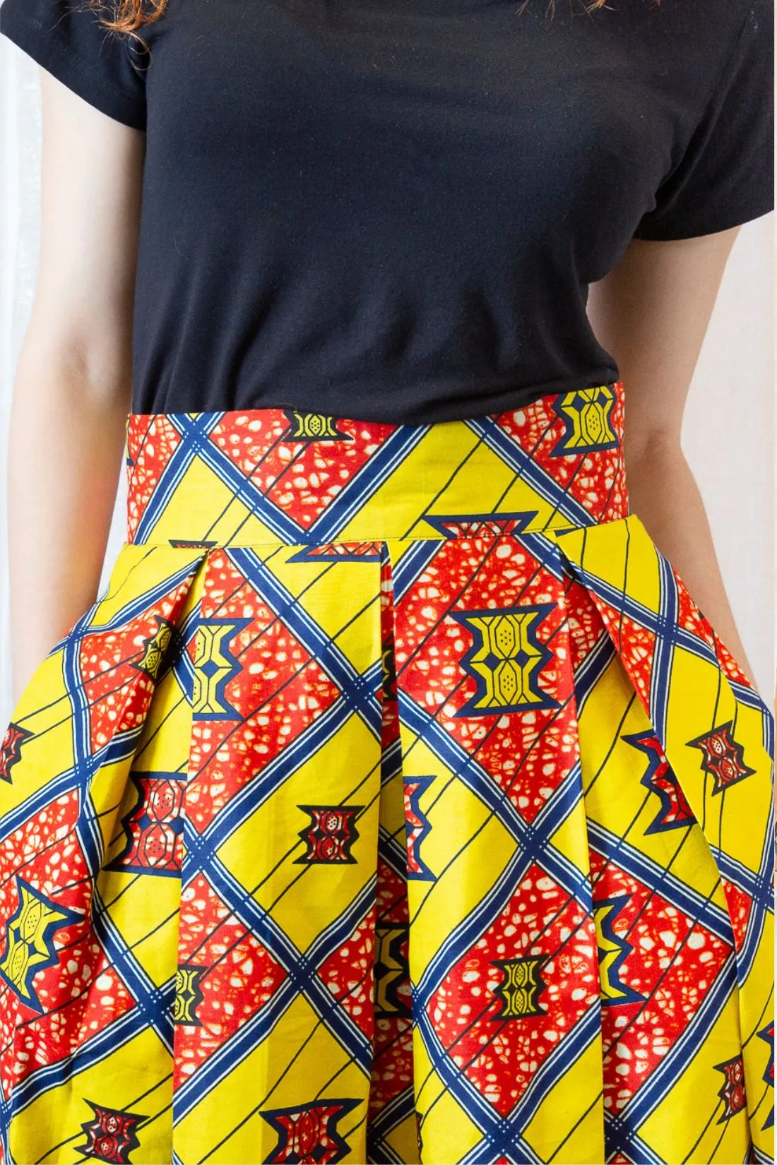 The Ultimate Chioma African Print Pleated Yellow Midi Skirt